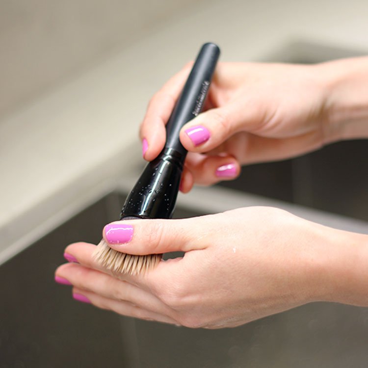 Squeeze Out Excess Water from makeup brush